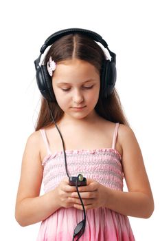 Young girl with headphones looking at something in her mobile or player.