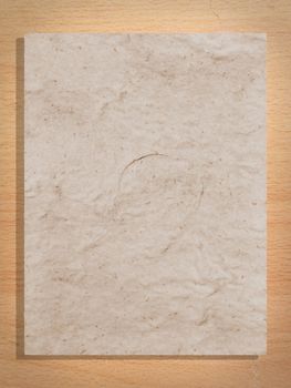 Whole page of mulberry paper on plywood background