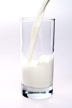 glass of milk with a bottle