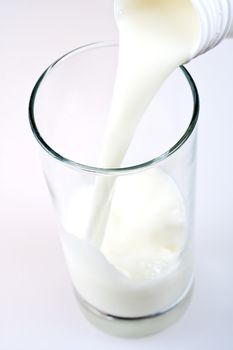 glass of milk with a bottle