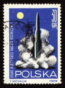 Postage stamp printed in Poland shows rocket start
