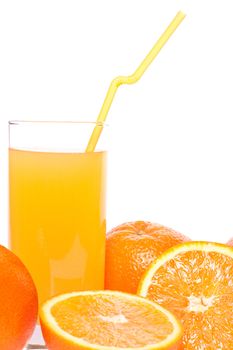 orange and juice in glass on a white background