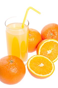 orange and juice in glass on a white background