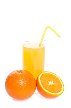 orange and juice in glass on a white background