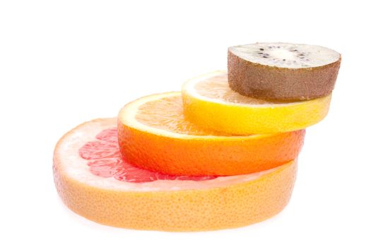 assorted fruits of orange, grapefruit, kiwi and lemon on a white background