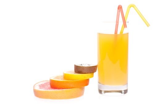 juice in glass with orange, grapefruit, kiwi and lemon on a white background