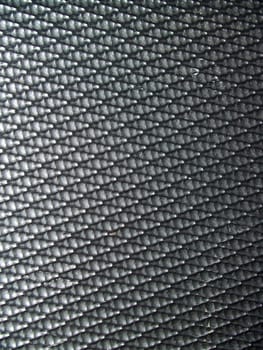 Closeup texture of black fiber mesh pattern