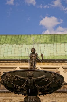 historic building, stucco on the walls, a statue