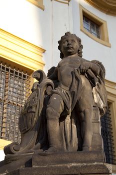 historic building, stucco on the walls, a statue