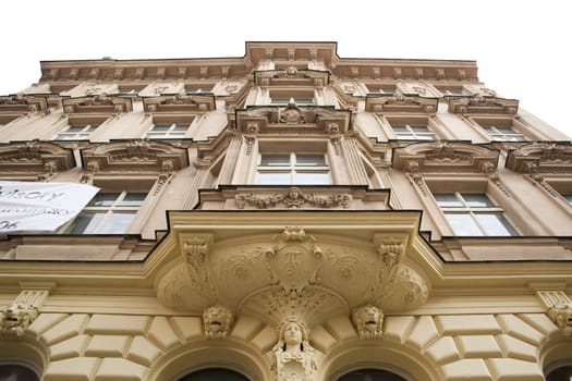 historic building, stucco on the walls, a statue