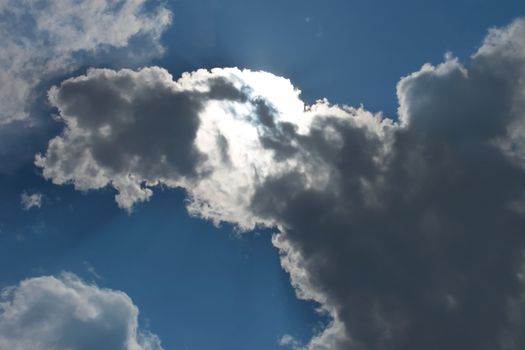 Cloudscape. The sun makes its way through clouds