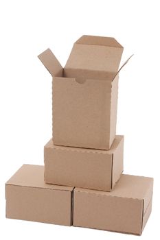Brown cardboard boxes arranged in stack on white background