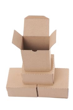 Brown cardboard boxes arranged in stack on white background