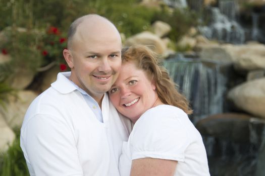 Attractive Couple Pose for Portrait in the Park.