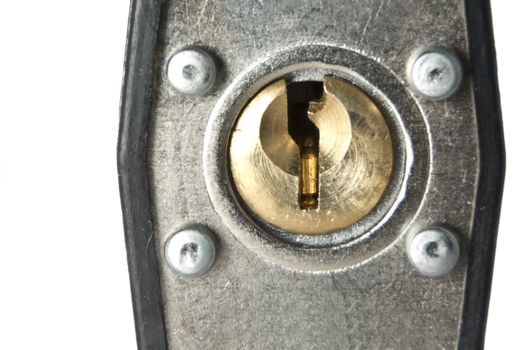 Closeup shot looking at a pin tumbler lock of a padlock