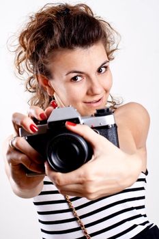 beautiful woman in a sailor's shirt with camera