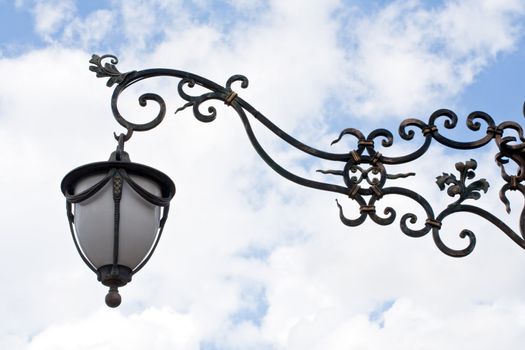 forged pattern streetlamp in the sky background