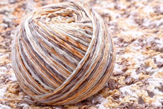 striped beige tangle of yarn as a background