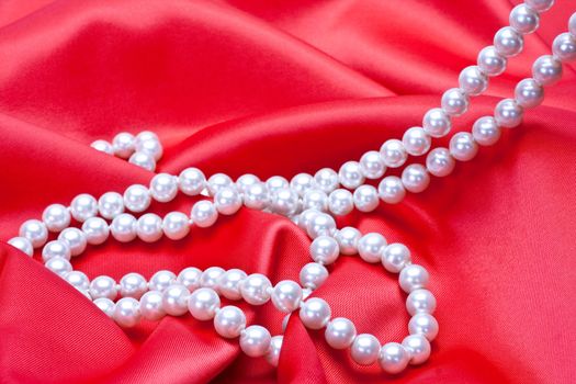 jewels on white satin as a background