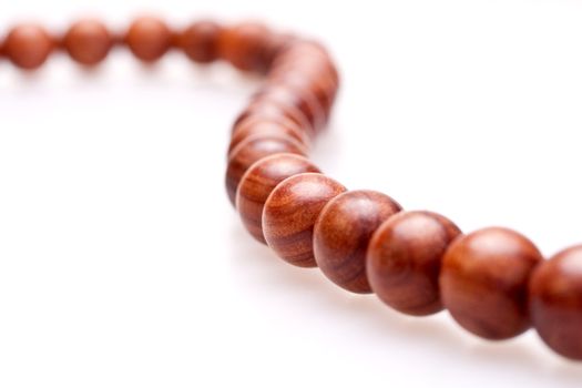 wooden beads on a white background