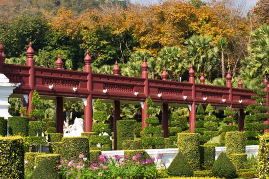 Red wooden bridge in the garden ,thailand