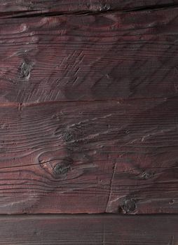 From seventeen century hard wooden planks with knots.