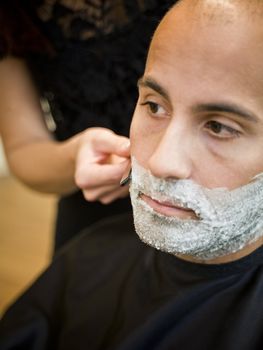 Shaving situation at the hair salon close-up