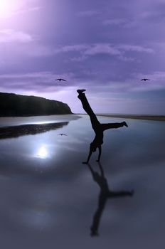 a young woman exercising on an isolated irish beach