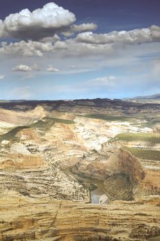 Dinosaur National Monument is a U.S. National Monument located on the southeast flank of the Uinta Mountains on the border between the American states of Colorado and Utah at the confluence of the Green and Yampa Rivers.