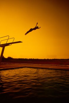 silhouette woman diving