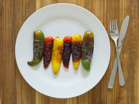 close up of a plate of grilled bell peppers