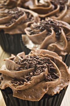 Lovely fresh chocolate cupcakes - very shallow depth of field