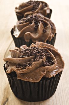 Lovely fresh chocolate cupcakes - very shallow depth of field