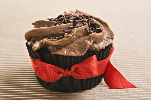 Chocolate cupcake with red bow