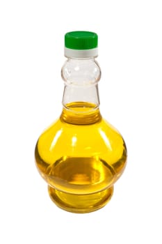 A bottle of sunflower oil, close-up, isolated on a white background.