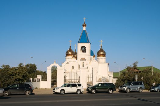 View of the Orthodox Church with the golden domes of the city of Aktau.