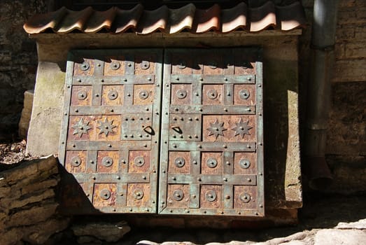 The strengthened door in a vault of a dominican monastery