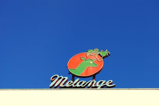 A melange advertisement on rooftop.