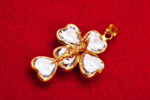Pendant of a crucifix with five zirconia enchased