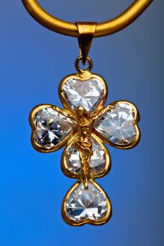 Pendant of a crucifix with five zirconia enchased