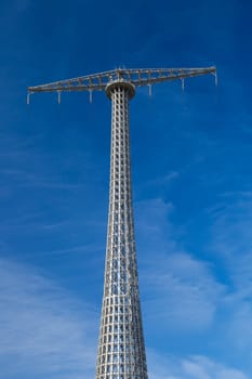 Communications tower with a beautiful blue sky