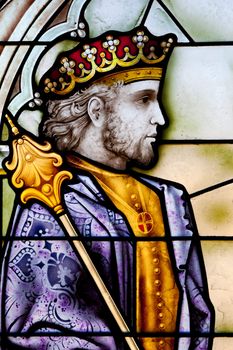 Wonderful ancient stained glass window formed of multiple colors