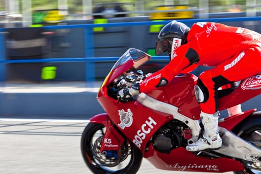 JEREZ DE LA FRONTERA, SPAIN - APR 17: Roman Ramos pilot his Moto2 motorcycle at the start of the CEV Championship on April 17, 2011 in Jerez de la Frontera, Spain.