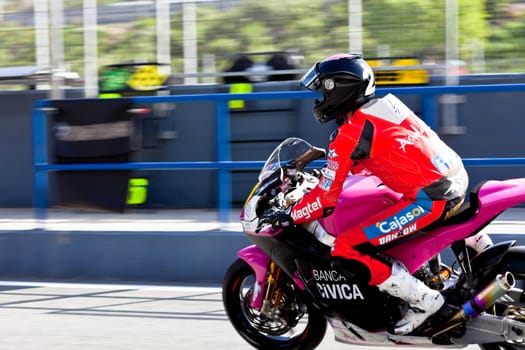 JEREZ DE LA FRONTERA, SPAIN - APR 17: Ivan Moreno pilots his Moto2 motorcycle at the start of the CEV Championship on April 17, 2011 in Jerez de la Frontera, Spain.
