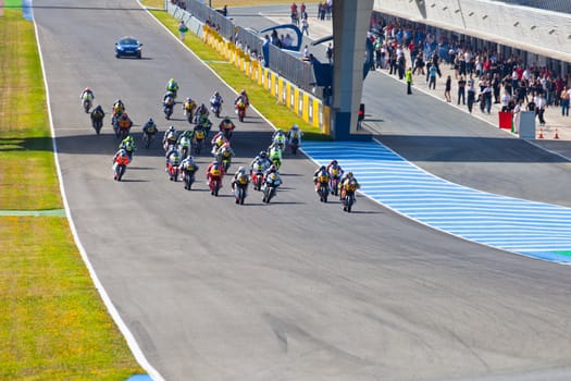 JEREZ DE LA FRONTERA, SPAIN - APR 17: Motorbike competitors begin the Moto2 race in the CEV Championship on April 17, 2011 in Jerez de la Frontera, Spain.