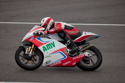 JEREZ DE LA FRONTERA, SPAIN - NOV 20: Kevin Szalai pilot of motorcycling of 125cc in the Spanish championship of velocity (CEV) on Nov 20, 2010, in racetrack of velocity of Jerez de la Frontera