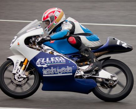 JEREZ DE LA FRONTERA, SPAIN - NOV 20: Federico Fazzina pilot of motorcycling of 125cc in the Spanish championship of velocity (CEV) on Nov 20, 2010, in racetrack of velocity of Jerez de la Frontera