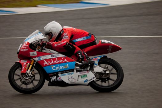 JEREZ DE LA FRONTERA, SPAIN - NOV 20: Miguel Oliveira pilot of motorcycling of 125cc in the Spanish championship of velocity (CEV) on Nov 20, 2010, in racetrack of velocity of Jerez de la Frontera