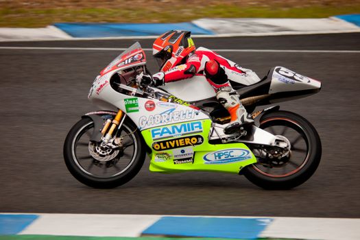 JEREZ DE LA FRONTERA, SPAIN - NOV 20: Niccolo Antonelli pilot of motorcycling of 125cc in the Spanish championship of velocity (CEV) on Nov 20, 2010, in racetrack of velocity of Jerez de la Frontera