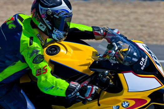 JEREZ DE LA FRONTERA, SPAIN - APR 17: Stock Extreme motorcyclist Juan Eric Gomez takes a curve in the CEV Championship race on April 17, 2011 in Jerez de la Frontera, Spain